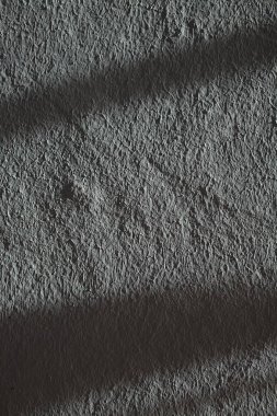 Düşük kontrastlı nötr arkaplan. Gri soyut taş doku arka planı. Arkaplan için alçı dokusu
