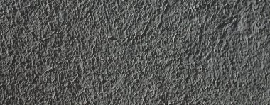 Düşük kontrastlı nötr arkaplan. Gri soyut taş doku arka planı. Arkaplan için alçı dokusu