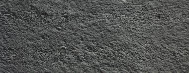 Düşük kontrastlı nötr arkaplan. Gri soyut taş doku arka planı. Arkaplan için alçı dokusu