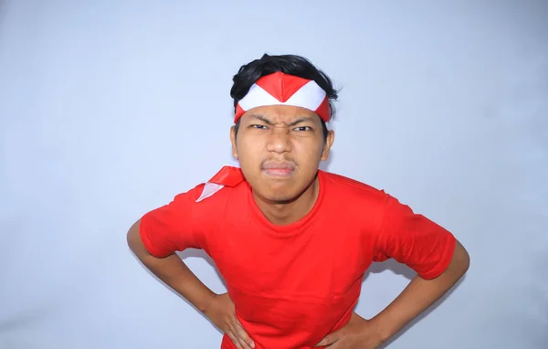 Angry Indonesian Man Hands Waist Looking Camera Wearing Red Shirt — Stock Photo, Image