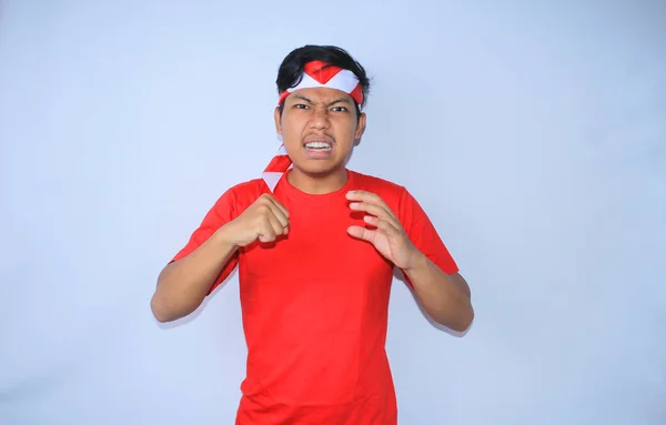 Wütender Indonesischer Junger Mann Der Indonesischen Unabhängigkeitstag Die Hände Hebt — Stockfoto