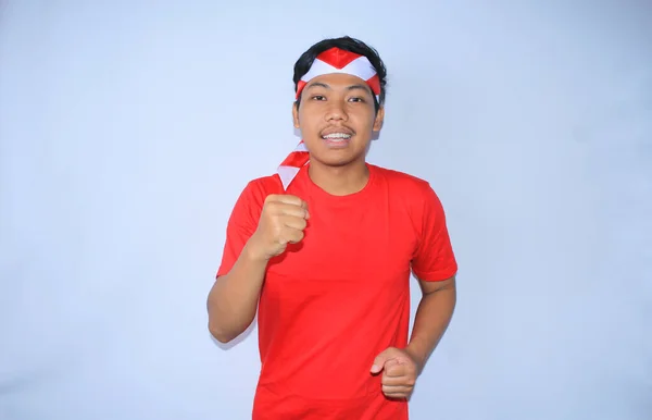 Feliz Joven Indonesio Hacer Pose Corriendo Con Cara Sonriente Para —  Fotos de Stock
