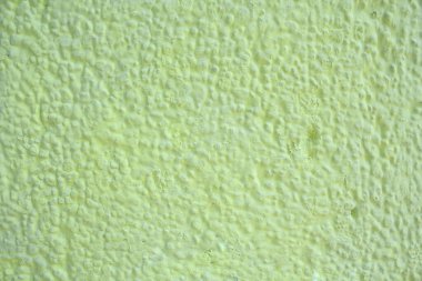 Taş desenli çimento duvar arkaplanı boyalı yeşil pastel renk