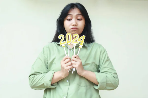 Thoughtful Asian Young Woman Thinking Looking 2024 Number Candles Holding Stock Photo