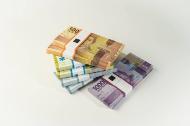 Jakarta, Endonezya, 15 Nisan 2023, çeşitli Endonezya rupiah desteleri IDR para biriminde binlerce kopya uzayı