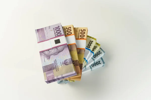 stock image Jakarta, Indonesia, April 15, 2023, various bundles of Indonesian rupiah banknotes in the IDR currency thousands copy space thr zaka