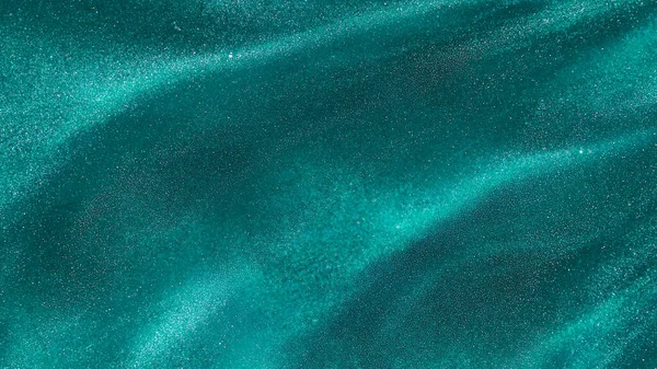 Cyan particles of azure dye in water