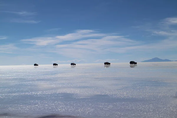 stock image Cars on Uyuni salt lake in Bolivia