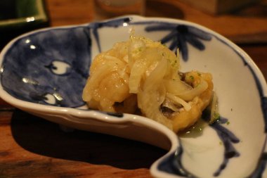 Japanese cuisine : Marinated hamo (daggertooth pike conger) and onion in Kyoto, Japan clipart