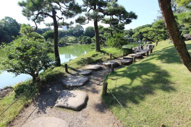 Step stones in Kiyosumi Garden, Tokyo, Japan clipart