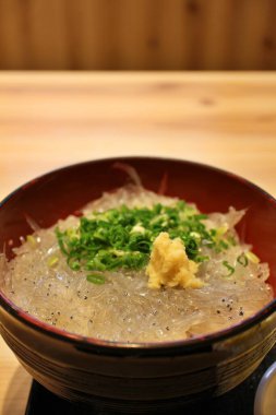 Japanese cuisine: raw whitebait rice bowl in Mishima, Japan clipart