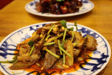 Sichuan cuisine (Chinese cuisine): beef shank and tripe tossed in chili oil with coriander clipart