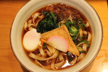 Japanese cuisine: kishimen udon noodles in Nagoya, Japan clipart