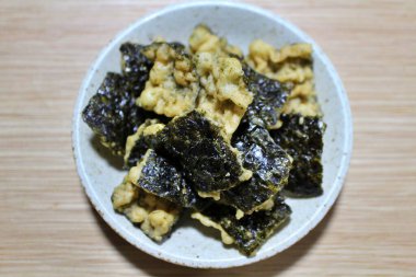 Japanese snack: nori tempura (deep fried seaweed) clipart