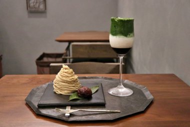 Iced matcha latte and Mont Blanc cake in Tokyo, Japan clipart