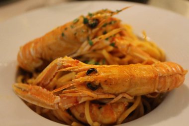 İtalyan mutfağı: Venedik, İtalya 'da spagetti alla busara (karides ve domates soslu spagetti)