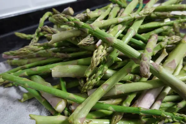 asparagus tips and green asparagus shoots cut for eating