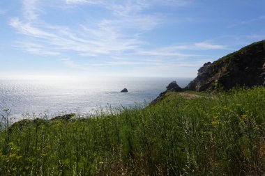 Güneş batarken Cape Finisterre, dünyanın sonunda Galiçya 'daki Atlantik Okyanusu.