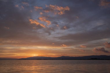 rocks silky water effect and pier with long exposure technique