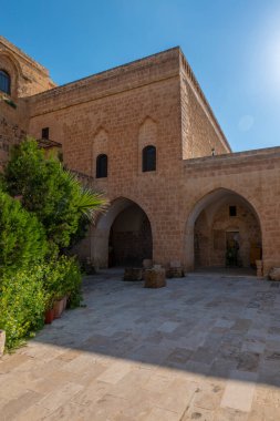 Mardin Deyrulzafaran Monastery stone building photographs taken from various angles clipart