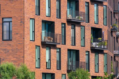 Kopenhag şehir merkezinden çeşitli fotoğraflar Danimarka liman sarayının başkenti renkli binalar kanallar ve genel şehir manzaralı bulutlu hava ve günbatımı renkleriyle