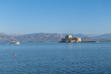 greece old capital nafplion streets shops churches castle and colorful houses quiet hours tourist destination clipart