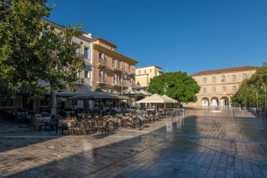 greece old capital nafplion streets shops churches castle and colorful houses quiet hours tourist destination clipart