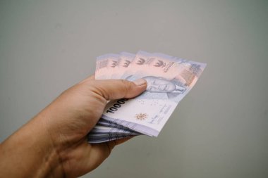 Bir tomar IDR bayramda birkaç çocuğa dağıtılmaya hazır olacak.