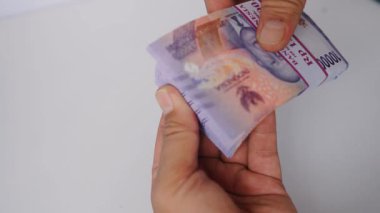 Endonezya Rupiah Banknotları Sayımı, Mali İşlem Konsepti