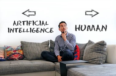 Man sitting on the couch with the words Artificial Intelligence and Human written on the wall next to him clipart