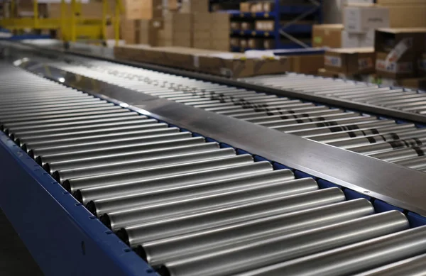stock image Conveyor belt inside a manufacturing site or distribution warehouse