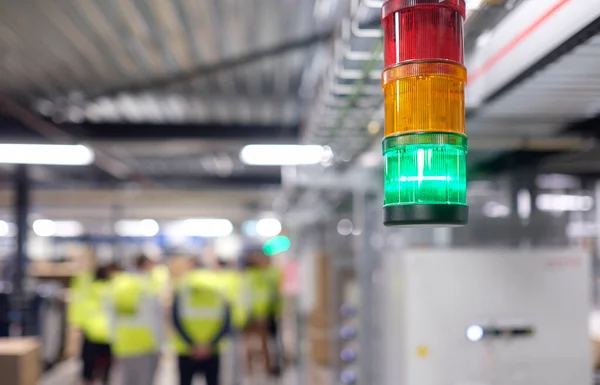 Green light inside a logistics and distribution warehouse