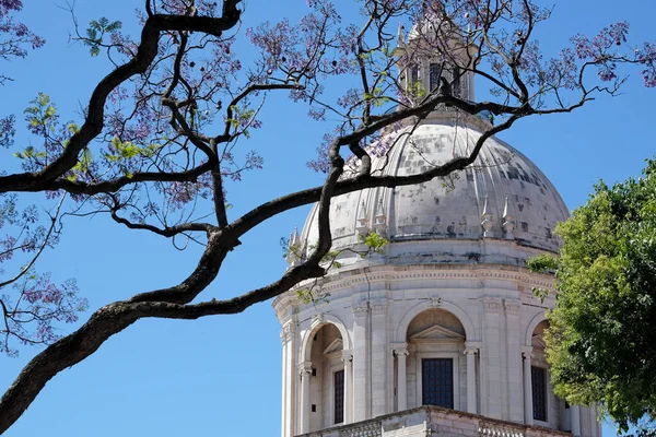 stock image The top of Igreja de Santa Engrcia - the Church of Santa Engrcia - against the blue sky