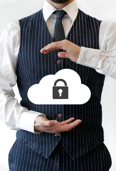 Businessman protects cloud with hands