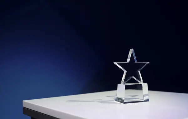 Premio Forma Estrella Una Mesa Con Proyectores Espacio Para Copiar Imagen de archivo