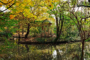 A garden temple around an artificial park pond in the garden of Villa Belgiojoso Bonaparte in Milan, Italy.