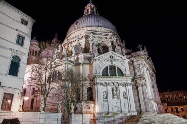 Venice Italy night view of Saint Mary of Health, Basilica di Santa Maria della Salute with cupola at Dorsoduro area.
