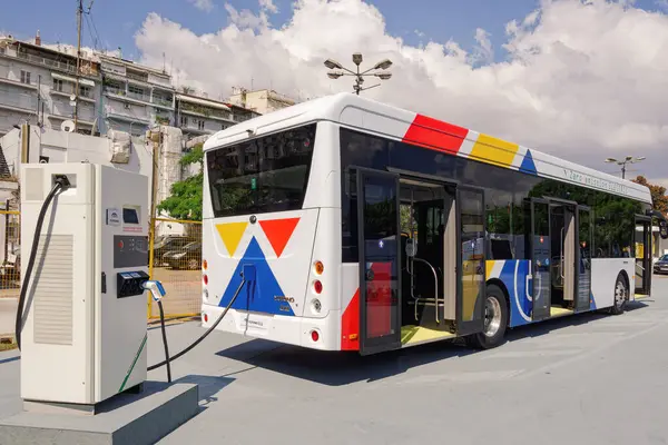 Stock image Thessaloniki, Greece - September 9 2023: Thessaloniki public transport zero-emission Yutong E12 electric bus operated by OASTH plug charging exhibited during an International Fair.