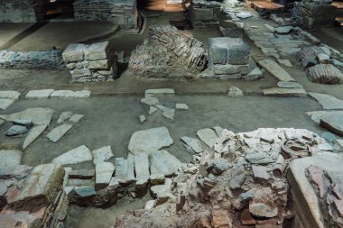 Thessaloniki, Greece - December 9 2024: Venizelou metro station interior ancient archaeological site, featuring ruins and artifacts. clipart