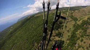 Paragliding tropikal ada okyanusu. Yüksek kalite 4k görüntü