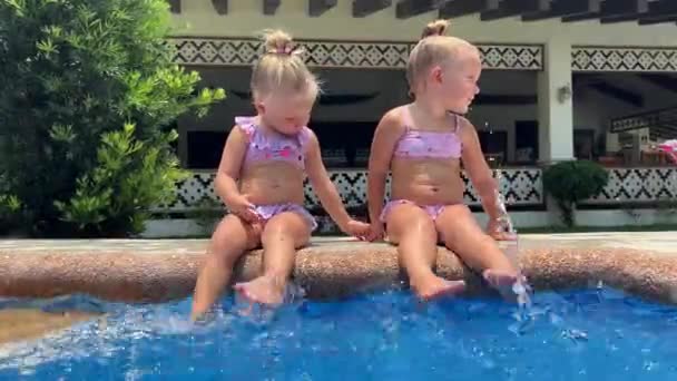 Little Girls Three Sisters Triplets Sisters Playing Pool Swimsuits High — Stock Video