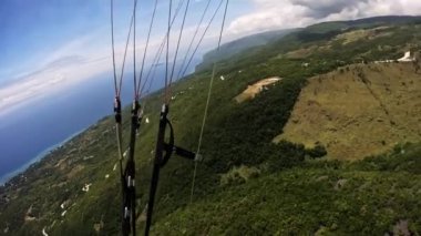 Paragliding tropikal ada okyanusu. Yüksek kalite 4k görüntü