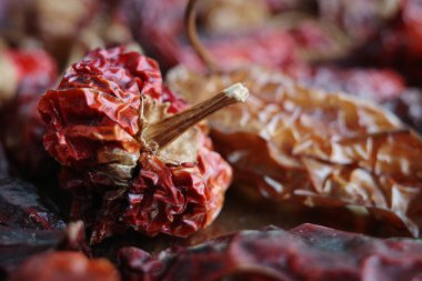 dried tomatoes on a wooden background
