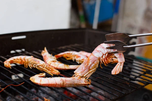 Grilled prawns on a homemade barbecue on a day off in a private home
