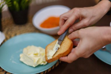 Homemade breakfast with pineapple butter, coffee and juice in the outdoor area in the morning