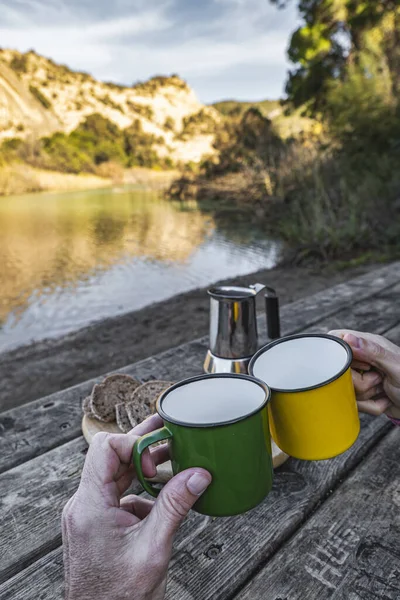Serene Breakfast: Bread, Coffee and Toast by the Tranquilo River