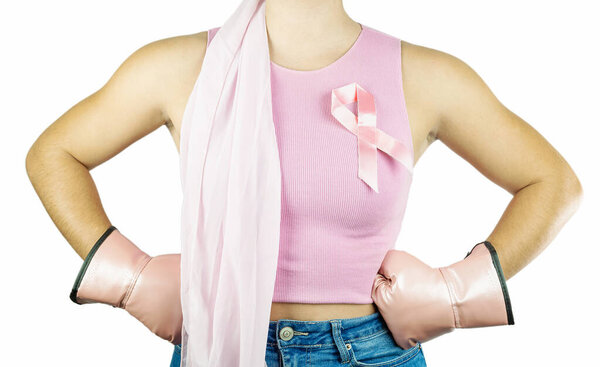 Breast cancer, woman with pink ribbon symbol and hands on hips with pink boxing glove, health care and health awareness campaign, white background