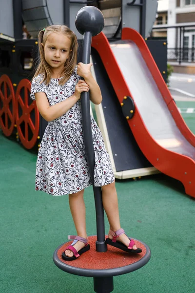 Child Playing Playground City Girl Spinning Balancing Preschooler Having Fun — Stock Photo, Image