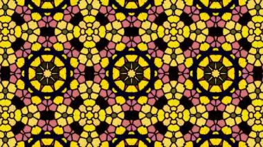 Çok renkli neon kaleydoskop soyut arka plan. Canlı renkleriyle, bu video herhangi bir projeye bir enerji patlaması eklemek için mükemmeldir. Dönen desenler ve kaleydoskopik etkiler.