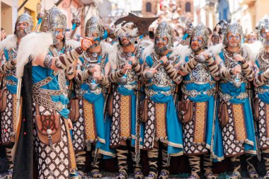 Alcoy, Spain, 04-20-2024: Special squad of the Basque troupe with its corporal in front in the Moors and Christians parade of Alcoy, a festival of international tourist interest since 1980 clipart